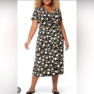 Leota Black and White V-Neck Flutter Sleeve Midi Dress